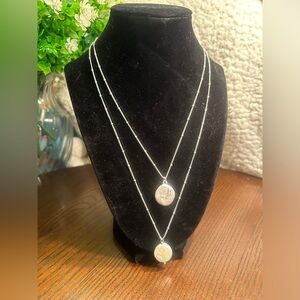 Silver-tone double-stranded necklace on lovely chain with flat white pendants